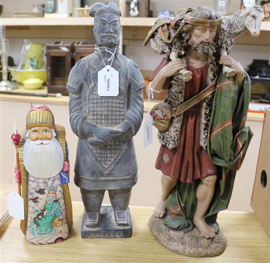 A Russian carved and painted wood figure of Grandfather Frost, signed to base and two other items,
